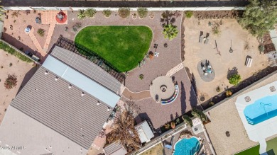 Stunning 4-br, 3-car garage home on a massive lot almost a half on Desert Mirage Golf Course in Arizona - for sale on GolfHomes.com, golf home, golf lot