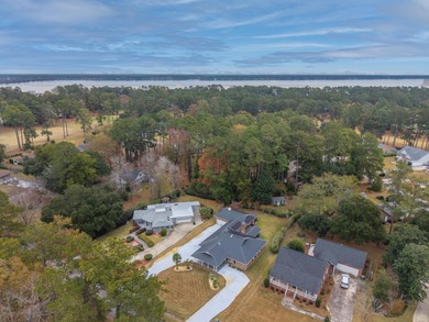 Welcome to this stunning and meticulously maintained 4-bedroom on Santee-Cooper Country Club in South Carolina - for sale on GolfHomes.com, golf home, golf lot