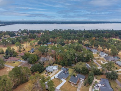 Welcome to this stunning and meticulously maintained 4-bedroom on Santee-Cooper Country Club in South Carolina - for sale on GolfHomes.com, golf home, golf lot