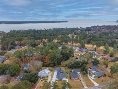 Welcome to this stunning and meticulously maintained 4-bedroom on Santee-Cooper Country Club in South Carolina - for sale on GolfHomes.com, golf home, golf lot