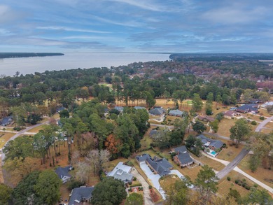 Welcome to this stunning and meticulously maintained 4-bedroom on Santee-Cooper Country Club in South Carolina - for sale on GolfHomes.com, golf home, golf lot
