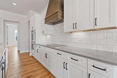 AMAZING OPPORTUNITY WITH RECENT PRICE IMPROVEMENT AND MOTIVATED on Traditions of Braselton Golf Club in Georgia - for sale on GolfHomes.com, golf home, golf lot