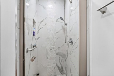 Gorgeous, updated, waterfront 2 bed 2 bath villa in highly on Kings Point Golf - Executive in Florida - for sale on GolfHomes.com, golf home, golf lot