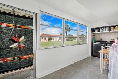 Gorgeous, updated, waterfront 2 bed 2 bath villa in highly on Kings Point Golf - Executive in Florida - for sale on GolfHomes.com, golf home, golf lot