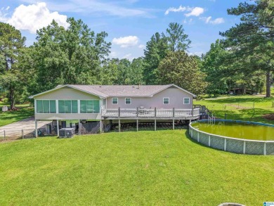 Nestled on a spacious lot alongside the golf course, this home on Cumberland Lake Country Club in Alabama - for sale on GolfHomes.com, golf home, golf lot