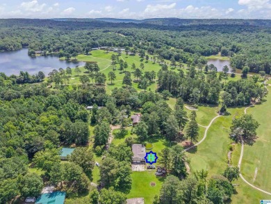 Nestled on a spacious lot alongside the golf course, this home on Cumberland Lake Country Club in Alabama - for sale on GolfHomes.com, golf home, golf lot