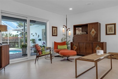 Welcome to 15801 Palmetto Club Drive. This stunning mid-century on Palmetto Golf Course in Florida - for sale on GolfHomes.com, golf home, golf lot