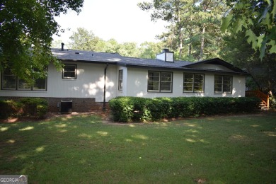 Welcome to your dream home overlooking Hole 2 of the prestigious on Honey Creek Country Club in Georgia - for sale on GolfHomes.com, golf home, golf lot