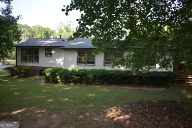 Welcome to your dream home overlooking Hole 2 of the prestigious on Honey Creek Country Club in Georgia - for sale on GolfHomes.com, golf home, golf lot