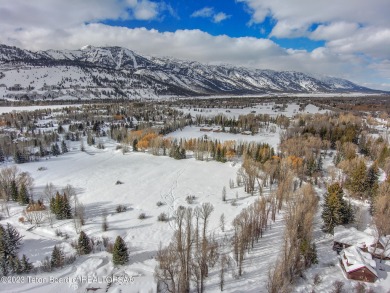 This stunning 3.2-acre land for sale in the coveted neighborhood on Teton Pines Golf Club in Wyoming - for sale on GolfHomes.com, golf home, golf lot