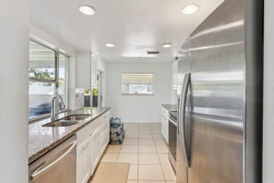6708 NW 57th Dr on Woodlands Country Club in Florida - for sale on GolfHomes.com, golf home, golf lot