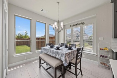 ACT NOW! Welcome to this immaculate corner-lot home in Argyle's on Lantana Golf Club in Texas - for sale on GolfHomes.com, golf home, golf lot