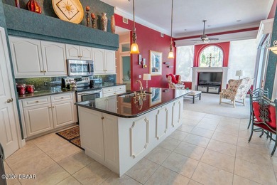 Pride of ownership shines throughout this immaculate well on Plantation Bay Golf and Country Club in Florida - for sale on GolfHomes.com, golf home, golf lot