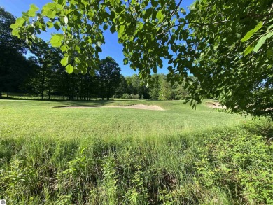 Surround yourself among nature and endless recreation on Manitou Passage Golf Club in Michigan - for sale on GolfHomes.com, golf home, golf lot