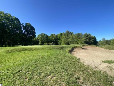 Surround yourself among nature and endless recreation on Manitou Passage Golf Club in Michigan - for sale on GolfHomes.com, golf home, golf lot