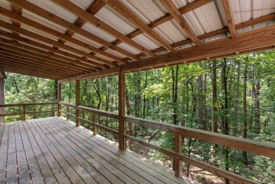 Discover a charming fixer-upper nestled in a secluded, quiet on Mountain Ranch Golf Club in Arkansas - for sale on GolfHomes.com, golf home, golf lot
