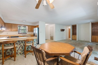 Discover a charming fixer-upper nestled in a secluded, quiet on Mountain Ranch Golf Club in Arkansas - for sale on GolfHomes.com, golf home, golf lot