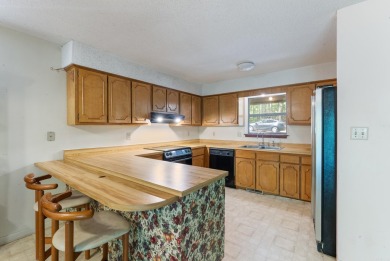 Discover a charming fixer-upper nestled in a secluded, quiet on Mountain Ranch Golf Club in Arkansas - for sale on GolfHomes.com, golf home, golf lot