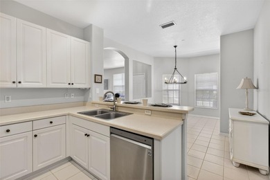 Lovely 2BD/2BA END UNIT villa located in The Links at Pelican on Pelican Pointe Golf and Country Club in Florida - for sale on GolfHomes.com, golf home, golf lot