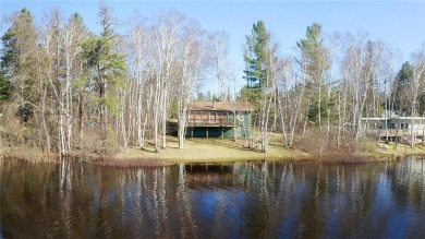 Mid Century Modern Lake Cottage! Private Golf Course Out Front on Eshquaguma Country Club in Minnesota - for sale on GolfHomes.com, golf home, golf lot