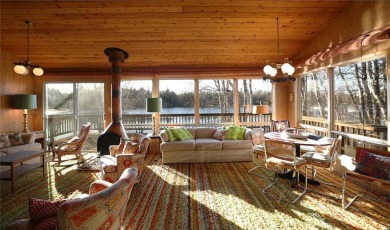 Mid Century Modern Lake Cottage! Private Golf Course Out Front on Eshquaguma Country Club in Minnesota - for sale on GolfHomes.com, golf home, golf lot