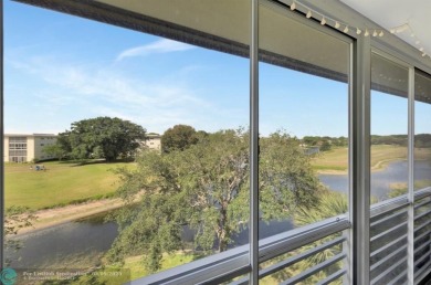 Modern, Fully Furnished Beautiful Updated Corner Unit in on Wynmoor Golf Course in Florida - for sale on GolfHomes.com, golf home, golf lot