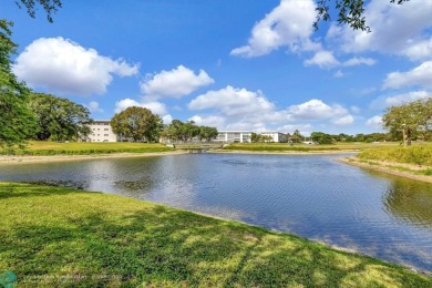 Modern, Fully Furnished Beautiful Updated Corner Unit in on Wynmoor Golf Course in Florida - for sale on GolfHomes.com, golf home, golf lot