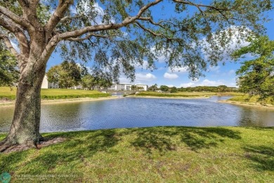 Modern, Fully Furnished Beautiful Updated Corner Unit in on Wynmoor Golf Course in Florida - for sale on GolfHomes.com, golf home, golf lot
