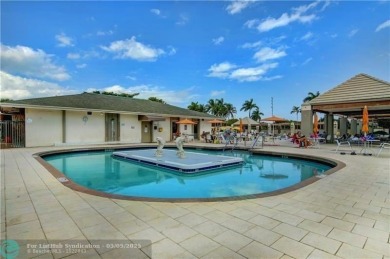 Modern, Fully Furnished Beautiful Updated Corner Unit in on Wynmoor Golf Course in Florida - for sale on GolfHomes.com, golf home, golf lot