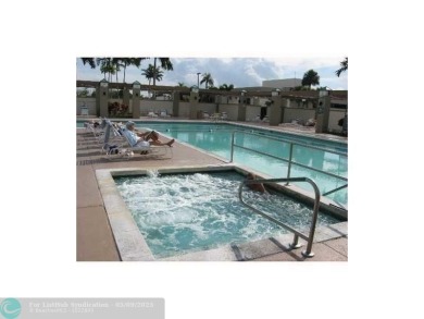 Modern, Fully Furnished Beautiful Updated Corner Unit in on Wynmoor Golf Course in Florida - for sale on GolfHomes.com, golf home, golf lot