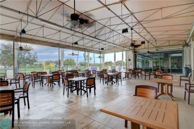 Modern, Fully Furnished Beautiful Updated Corner Unit in on Wynmoor Golf Course in Florida - for sale on GolfHomes.com, golf home, golf lot