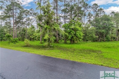 Welcome to the exclusive gated community of Coopers Point, where on Sapelo Hammock Golf Club in Georgia - for sale on GolfHomes.com, golf home, golf lot