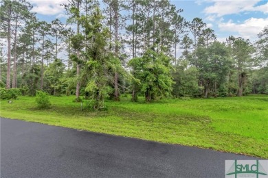 Welcome to the exclusive gated community of Coopers Point, where on Sapelo Hammock Golf Club in Georgia - for sale on GolfHomes.com, golf home, golf lot