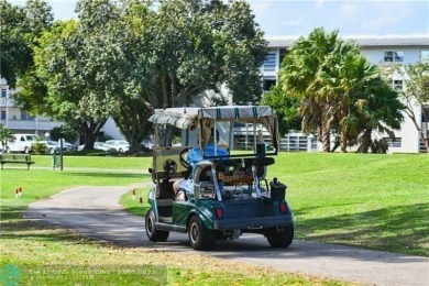Modern, Fully Furnished Beautiful Updated Corner Unit in on Wynmoor Golf Course in Florida - for sale on GolfHomes.com, golf home, golf lot