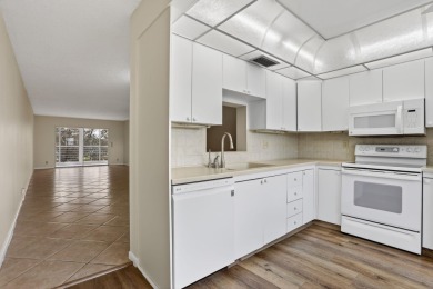 CORNER UNIT!   Windows are in the main and 2nd bedroom on Wynmoor Golf Course in Florida - for sale on GolfHomes.com, golf home, golf lot