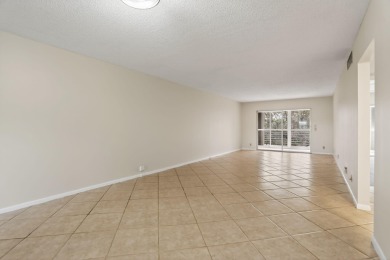 CORNER UNIT!   Windows are in the main and 2nd bedroom on Wynmoor Golf Course in Florida - for sale on GolfHomes.com, golf home, golf lot