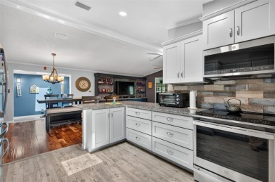 Welcome to 3109 Sand Trap Court, nestled within one of the on Highland Fairways Golf Club in Florida - for sale on GolfHomes.com, golf home, golf lot