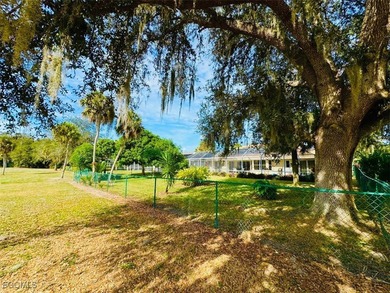 Absolutely beautiful and unique property! No HOA, but connected on Lehigh Resort Club in Florida - for sale on GolfHomes.com, golf home, golf lot