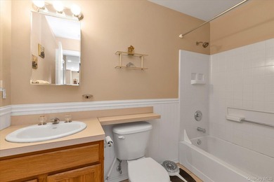 Welcome to this move in ready 2 bedroom, 2 full bath residence on The Greens At Half Hollow in New York - for sale on GolfHomes.com, golf home, golf lot