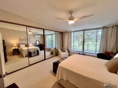 Floor to ceiling windows capture the relaxing golf course views on Yuma Golf and Country Club in Arizona - for sale on GolfHomes.com, golf home, golf lot