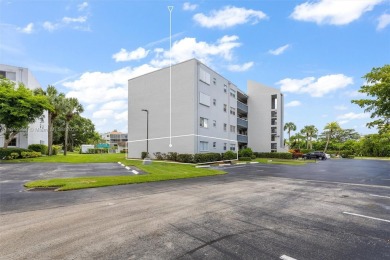 Fully remodeled 3BD/2BA first-floor corner unit in Dorchester at on Poinciana Golf Club in Florida - for sale on GolfHomes.com, golf home, golf lot