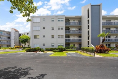 Fully remodeled 3BD/2BA first-floor corner unit in Dorchester at on Poinciana Golf Club in Florida - for sale on GolfHomes.com, golf home, golf lot