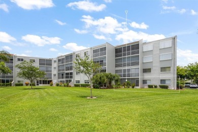 Fully remodeled 3BD/2BA first-floor corner unit in Dorchester at on Poinciana Golf Club in Florida - for sale on GolfHomes.com, golf home, golf lot