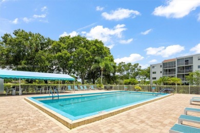 Fully remodeled 3BD/2BA first-floor corner unit in Dorchester at on Poinciana Golf Club in Florida - for sale on GolfHomes.com, golf home, golf lot