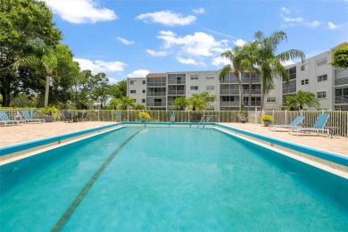 Fully remodeled 3BD/2BA first-floor corner unit in Dorchester at on Poinciana Golf Club in Florida - for sale on GolfHomes.com, golf home, golf lot