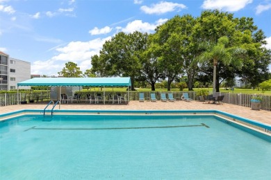 Fully remodeled 3BD/2BA first-floor corner unit in Dorchester at on Poinciana Golf Club in Florida - for sale on GolfHomes.com, golf home, golf lot
