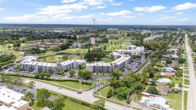 Fully remodeled 3BD/2BA first-floor corner unit in Dorchester at on Poinciana Golf Club in Florida - for sale on GolfHomes.com, golf home, golf lot