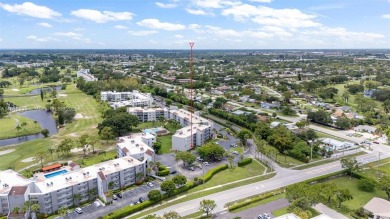Fully remodeled 3BD/2BA first-floor corner unit in Dorchester at on Poinciana Golf Club in Florida - for sale on GolfHomes.com, golf home, golf lot