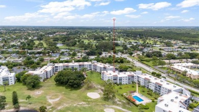 Fully remodeled 3BD/2BA first-floor corner unit in Dorchester at on Poinciana Golf Club in Florida - for sale on GolfHomes.com, golf home, golf lot