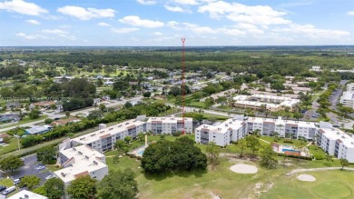 Fully remodeled 3BD/2BA first-floor corner unit in Dorchester at on Poinciana Golf Club in Florida - for sale on GolfHomes.com, golf home, golf lot